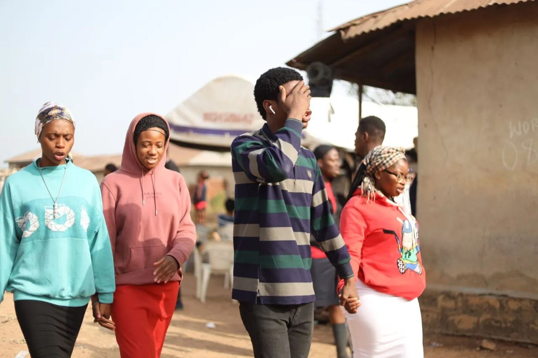 Team members walking through the town