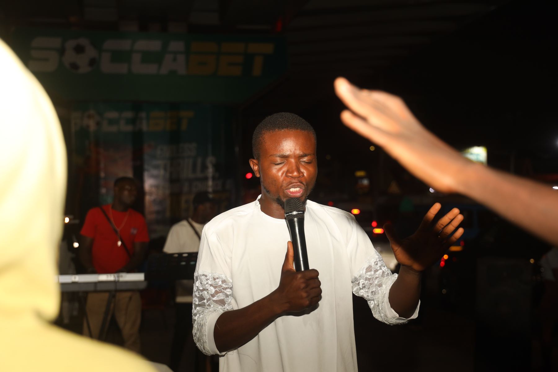 The host ministering during the crusade