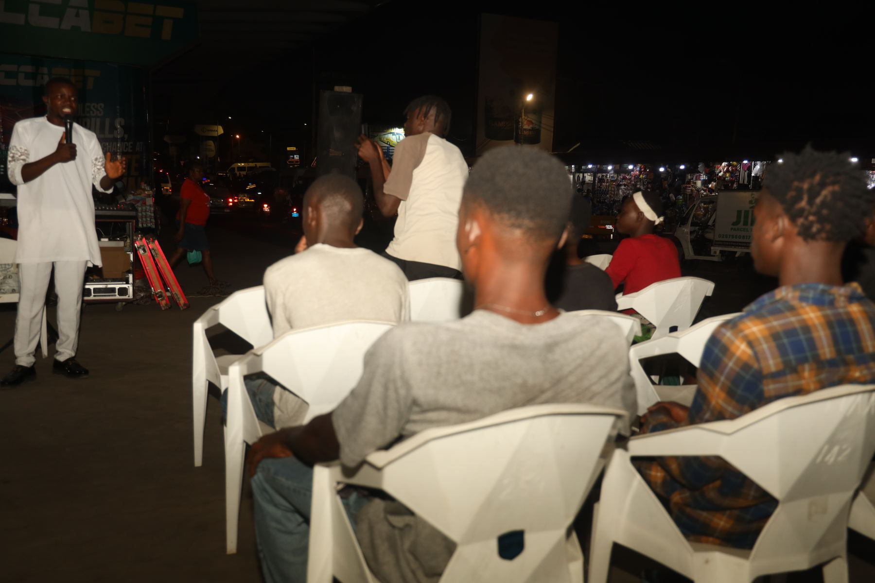 Young men sitting and receiving the word