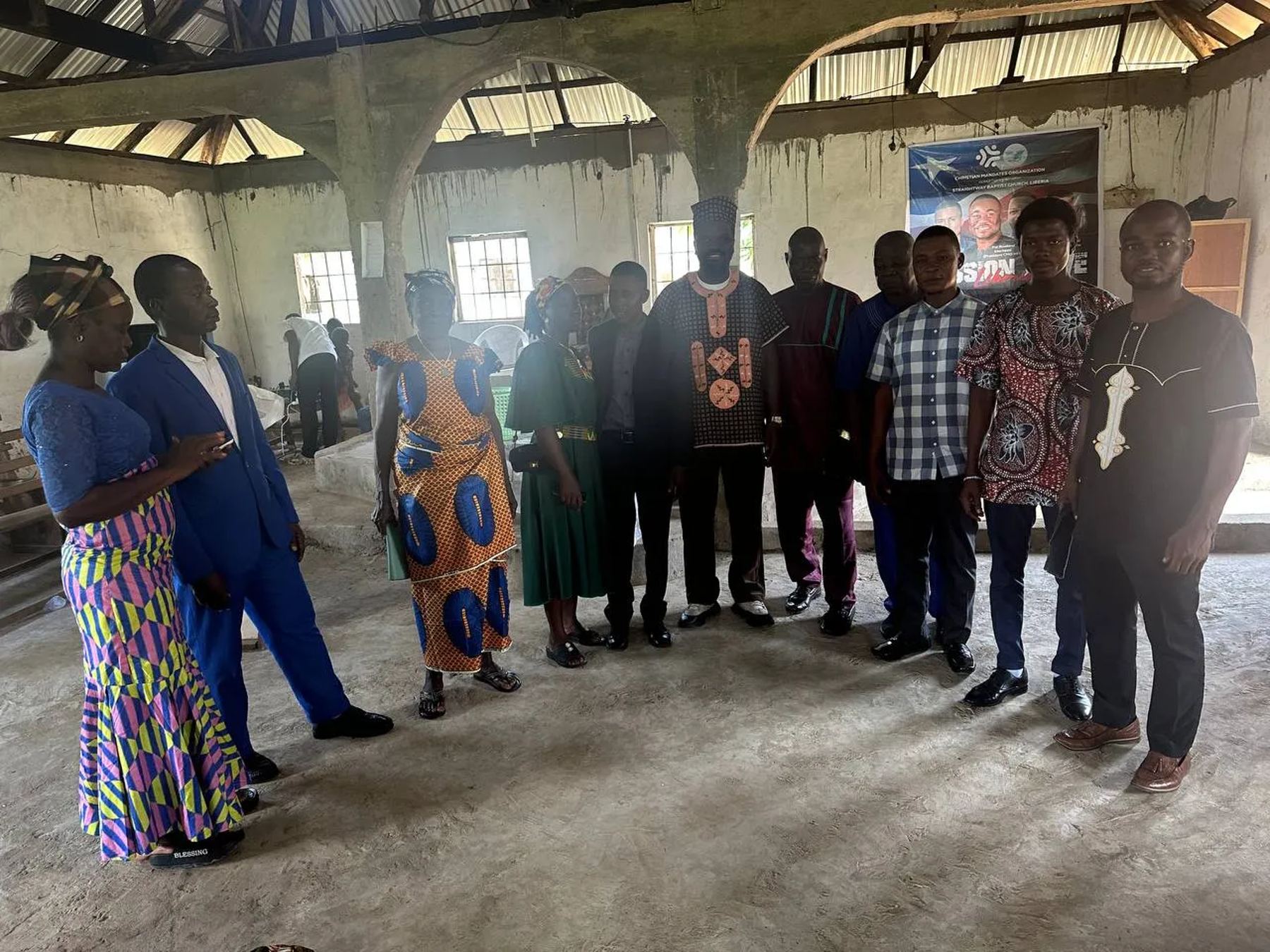 Church leaders and team members standing in a line in the church